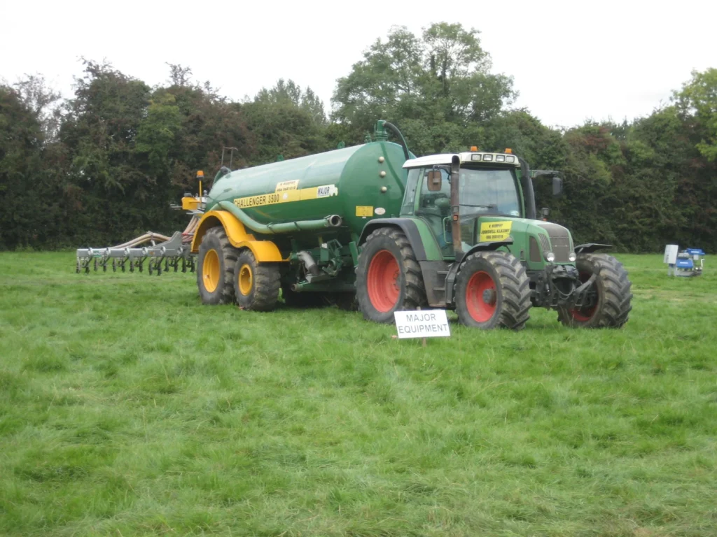 Fendt tractor with a slurry tanker on wide flotation tires