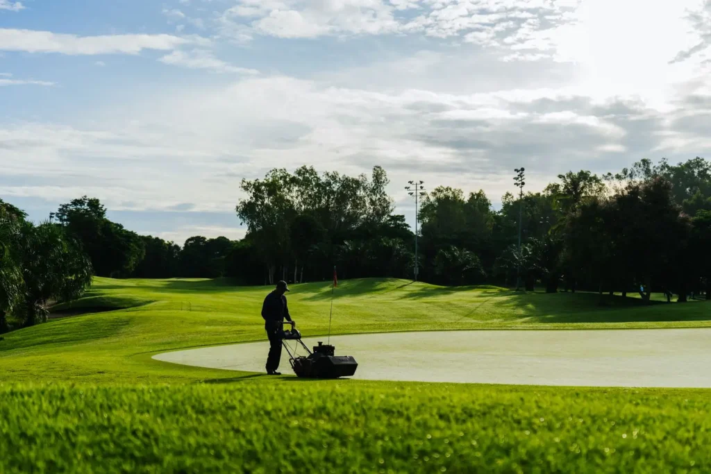 R3 Tires: What They Are, Where They Work and When They Don't Groundskeeper mowing the green on a golf course on a sunny day
