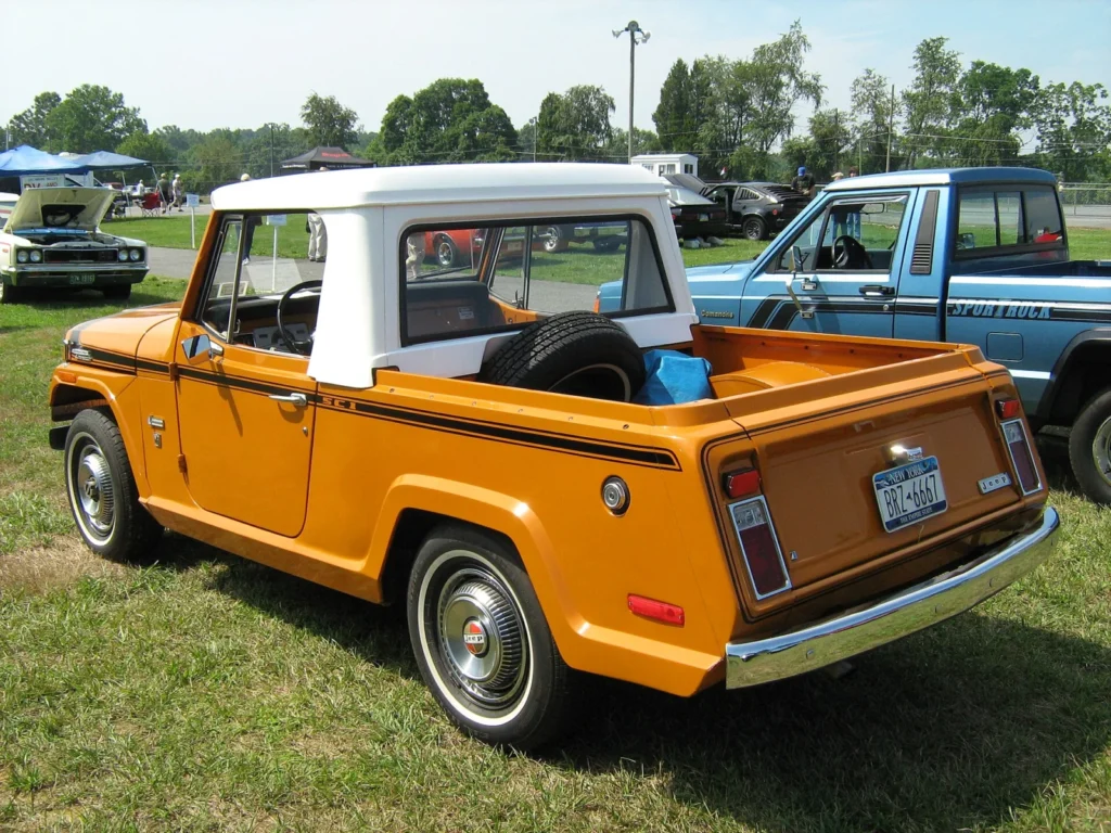 Orange 1971 Jeepster Commando pickup truck