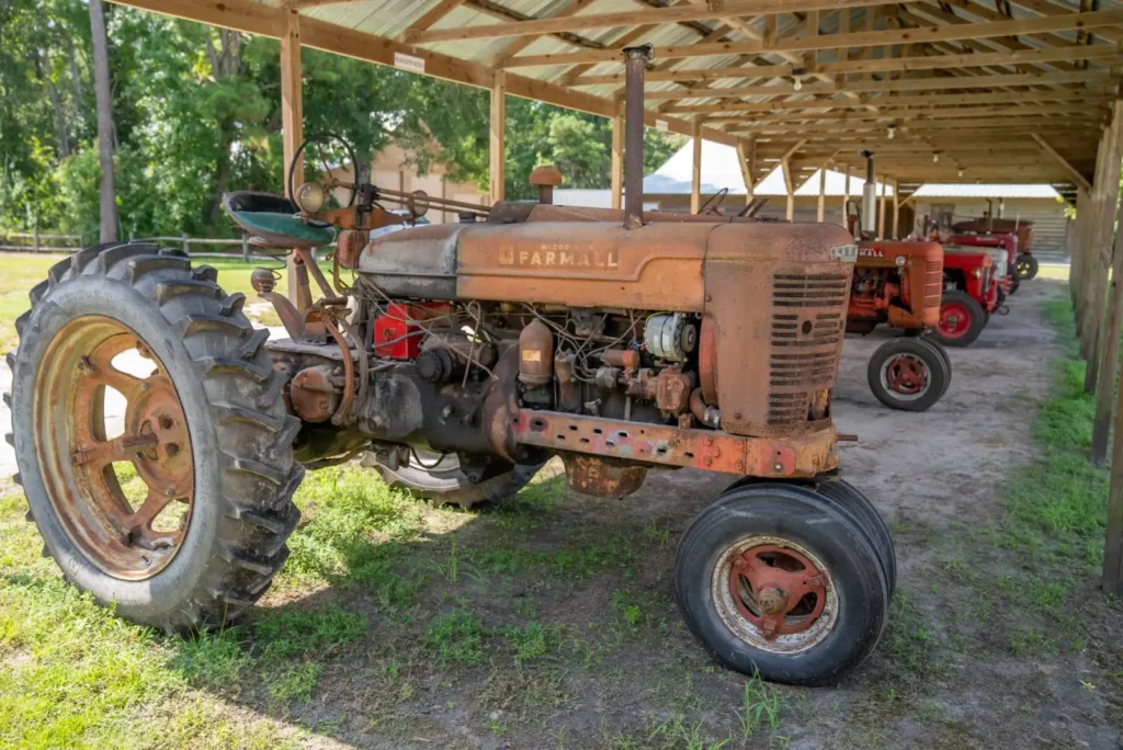 DOT Tractor Tires: How to Read the Date Code and Tire Age Old Farmall tractor parked in a rustic barn
