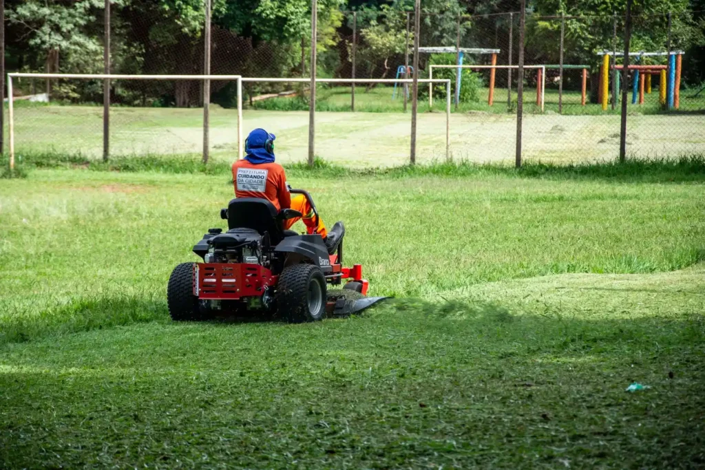 R3 Tires: What They Are, Where They Work and When They Don't Person riding a lawn mower across a grassy park