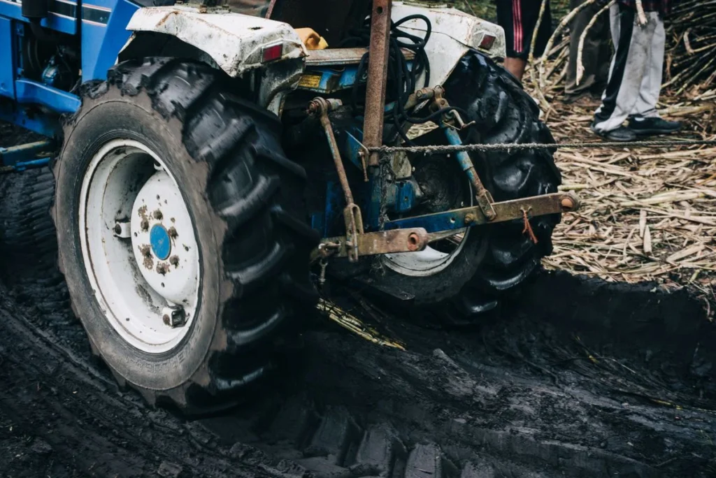 Tractor Tire Size Guide: How to Read Every Number on the Sidewall Rear tractor tire working in cultivated soil